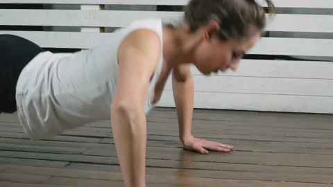 Athletic woman does push ups Video stock 163613565