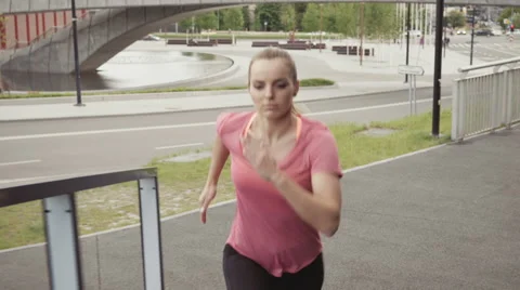 Athletic woman doing interval running exercise on stairs. Stock Footage 64337100