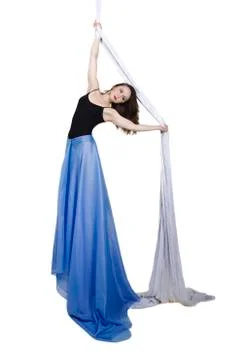 Athletic woman doing some tricks on silks Foto stock