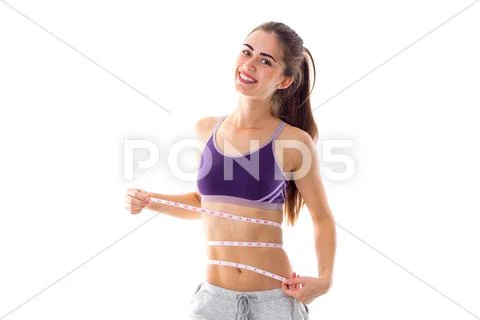 Athletic woman holding cantimeter Stock Photos