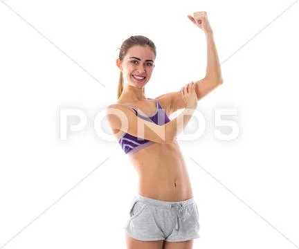 Athletic woman showing her biceps Stock Photos