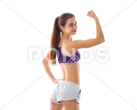 Athletic woman showing her biceps Stock Photos