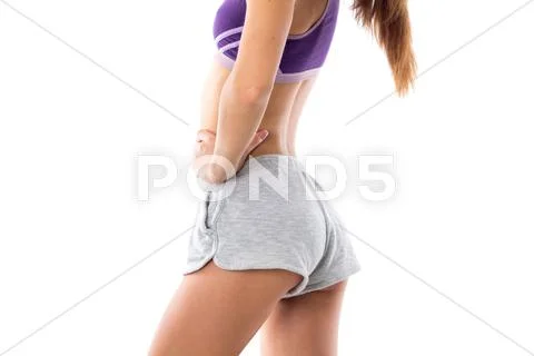 Athletic woman showing her buttocks Stock Photos