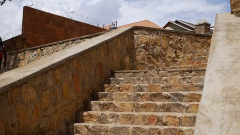  Athletic young African man performing parkour outdoors on stairs  Stock Footage 117675166