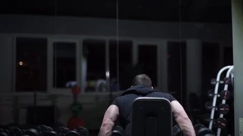 Athletic Young Male Does Dumbbell Exercises at Gym Stock-Footage 72000939