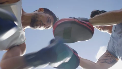 Athletic young man doing boxing training outdoors, in slow motion Stock Footage 86889250