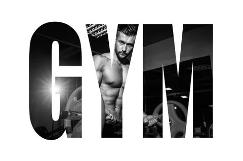 Athletic young man doing exercises with barbell in gym. Handsome muscular bod Stock Photos