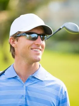 Athletic young man playing golf 스톡 사진