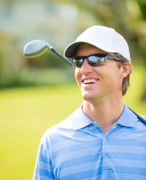 Athletic young man playing golf 스톡 사진