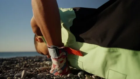Athletic young man with practicing push up outdoor Stock Footage 210719814