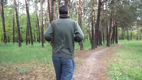 Athletic young man running in the nature. Healthy lifestyle Stock Footage 107372202