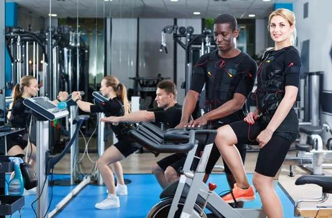 Athletic young people during functional workout with electric muscle stimulation 写真素材