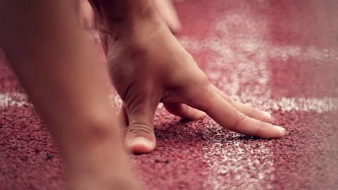 Athletics. Sprinter getting ready to start. Close-up. Video stock 70952800