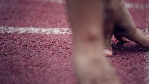 Athletics. Sprinter getting ready to start. Close-up. Stock Footage 70952850