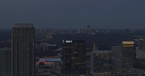 Atlanta Aerial v509 Panning around Atlantic Station neighborhood at dusk Stock Footage