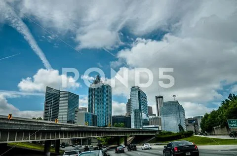 Atlanta city skyline and highway traffic Stock Photos
