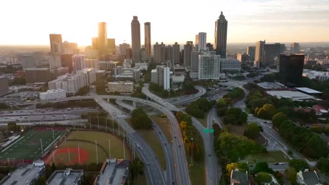 Atlanta Georgia skyline. Aerial pullback reveal above Interstate 20. Stock Footage 223070809