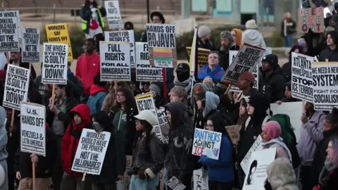 Atlanta hosts 'Stop ICE Terror' protest on Trump inauguration anniversary, ATLAN Stock Footage 327250352