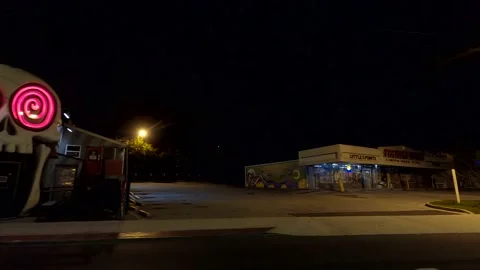 Atlanta at night pan away from The Vortex bar Little 5 points Video stock 194573546