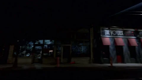 Atlanta at night pan to The Vortex bar Little 5 points Moreland Ave Video stock 194573391