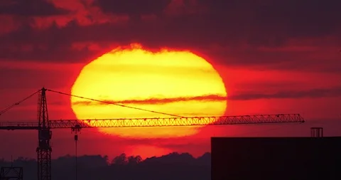 Atlanta Sunset behind construction crane Stock Footage 109208254