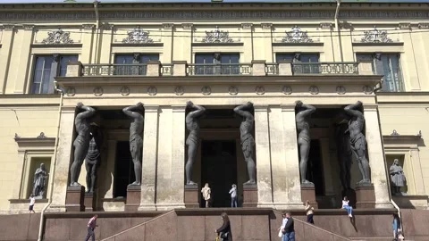 Atlanteans in the Hermitage support a massive balcony. Russia, Saint Petersburg Stock Footage 155924431