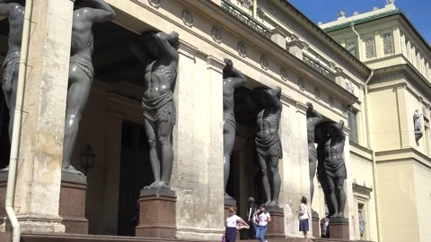 Atlanteans in the Hermitage support a massive balcony. Russia, Saint Petersburg Stock Footage 155924434