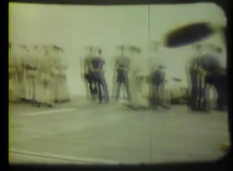 ATLANTIC - 1944: Deck operations - Men gather beneath a blade and wing Stock Footage 343932016