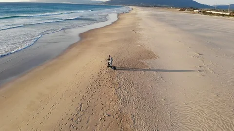 Atlantic coast beach is the city of Tarifa Spain, waves surf and sandy beach Stock Footage 101634469