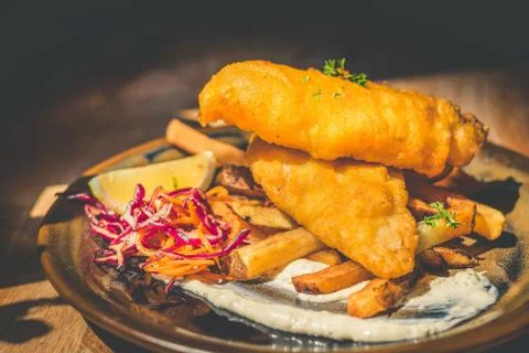 Atlantic Cod Fish And Chips Atlantic Cod is lean and white with a sweet, deli Stock Photos