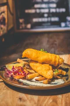 Atlantic Cod Fish And Chips Atlantic Cod is lean and white with a sweet, deli Stock Photos