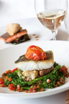 Atlantic cod served with white wine Stock Photos