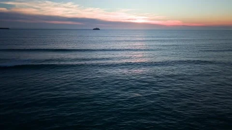 Atlantic Ocean sunset with waves and rocks coastal aerial footage Stock Footage 331194325