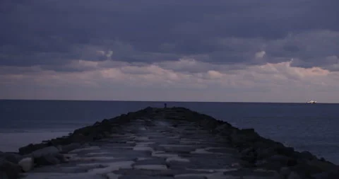 Atlantic ocean view with a jetty in the middle Stock Footage 144982666