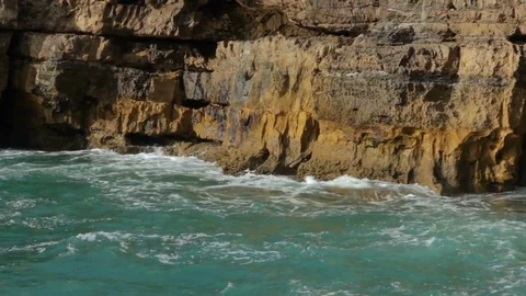 Atlantic ocean waves and caves into cliff rocks, Devils Mouth, Portugal Vídeo Stock 78137221