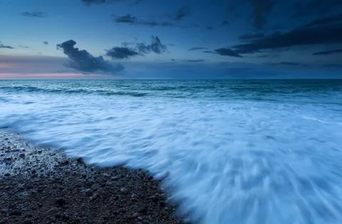 Atlantic ocean waves in dusk Stock Photos
