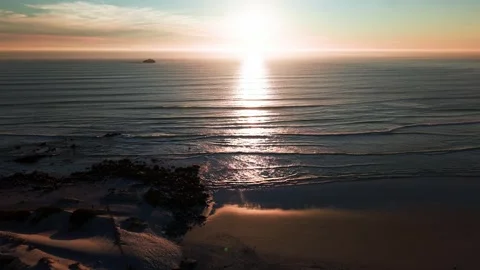 Atlantic Ocean waves with golden sunset reflection aerial seascape Stock Footage 330879691
