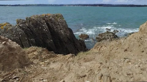 Atlantic Ocean Waves Hitting Rocky Shore in Brittany Stock Footage 332948459