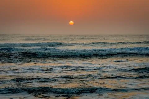 Atlantic Ocean waves at sunset Skeleton Coast National Park in Namibia, Africa. Stock Photos