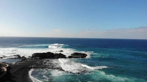Atlantic waves on the background of mountains and sunset on island Stock Footage 105009766