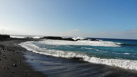 Atlantic waves on the background of mountains and sunset on island Stock Footage 105010170