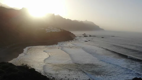 Atlantic waves on the background of mountains and sunset on island Stock Footage 105010804