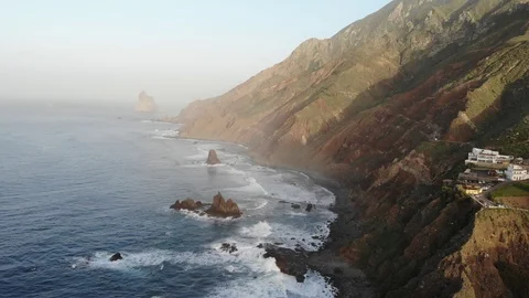 Atlantic waves on the background of mountains and sunset on island Vídeo Stock 105010866