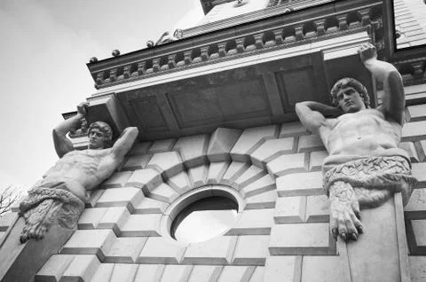 Atlases as decorative elements of the facade Stock Photos