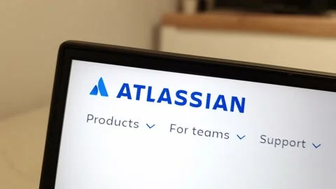 Atlassian software company website displayed on laptop computer Stock Footage 235529000