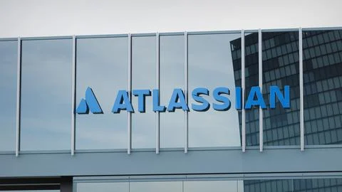 Atlassian Stock data presented on the logo of the office facade editorial Stock Photos