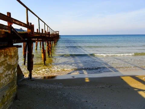 Atlit Coast Morning view with old deck, North District of Israel. Stock Photos