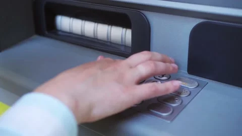 ATM Banking. Enter pin code in cash machine. Close up of person typing personal Stock Footage 186001954