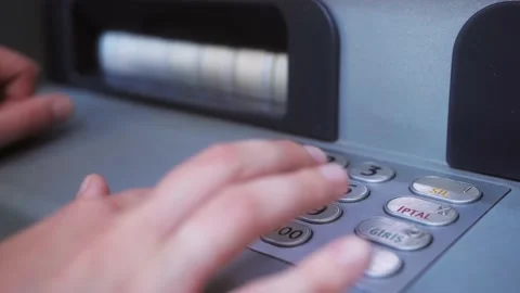 ATM Banking. Enter pin code in cash machine. Close up of person typing personal Stock Footage 194574110
