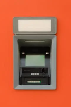 ATM with a display on an orange background Stock Photos